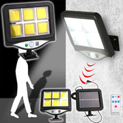 Trade Shop - Faro Proiettore Con Pannello Solare Sensore Movimento Telecomando 128 Led 6 Cob -