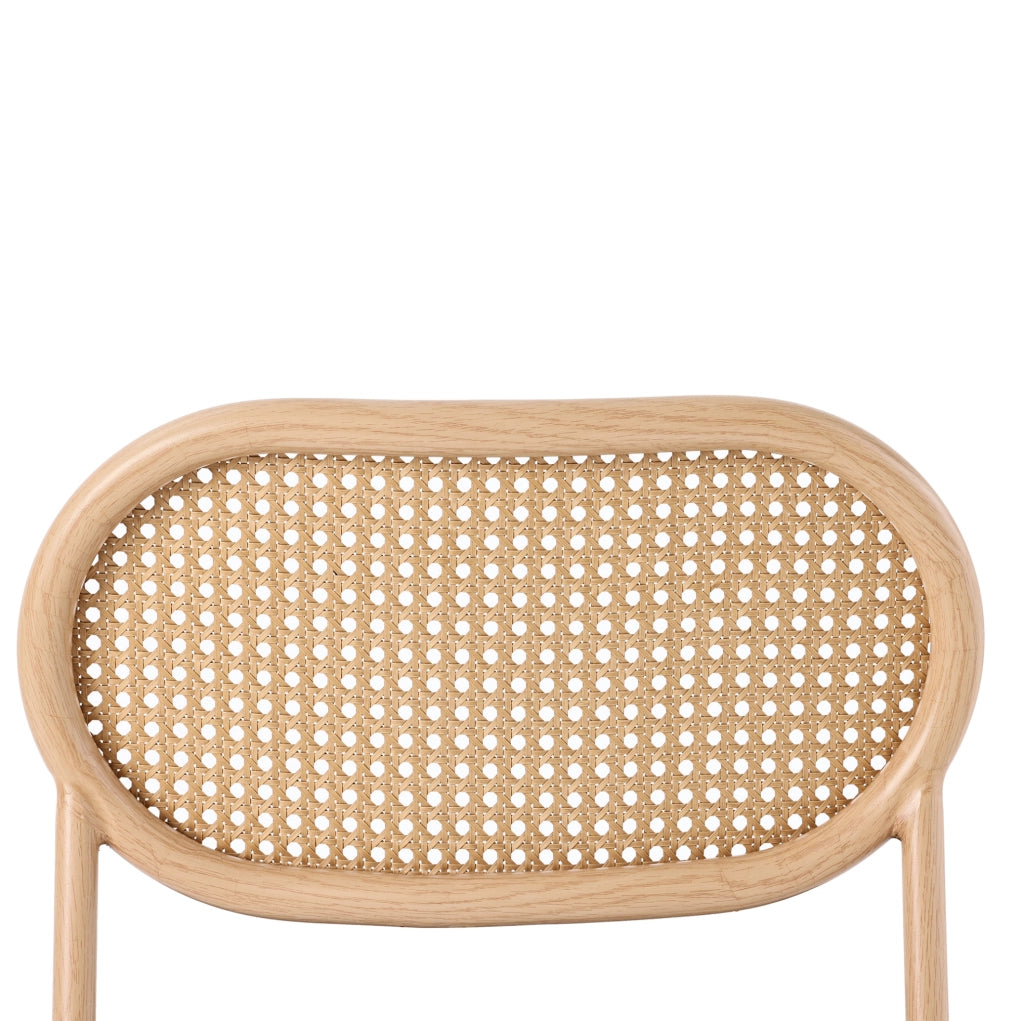 Set di 4 sedie da pranzo con schienale ovale in rattan naturale; seduta marrone in PU e gambe in metallo