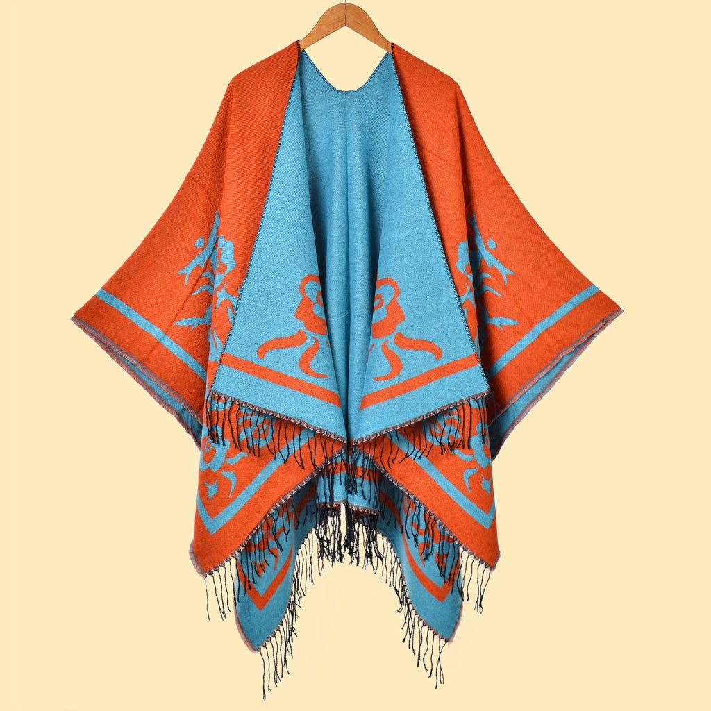 Mantella da donna con spacco diagonale e laccetti a pois color fango, con frange.