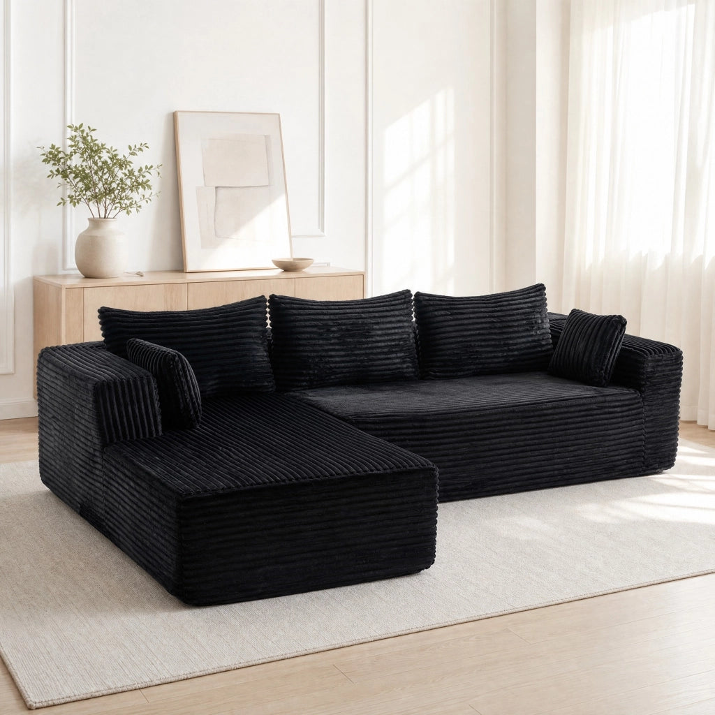 Divano modulare angolare a L con chaise longue in velluto a coste nero