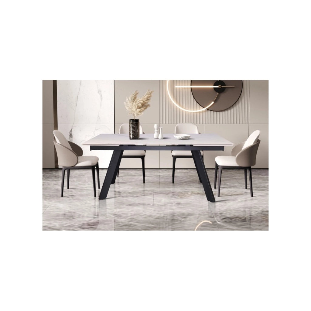 Tavolo da pranzo allungabile per 10 persone con piano in pietra bianca, collezione LAROS. Struttura in metallo.