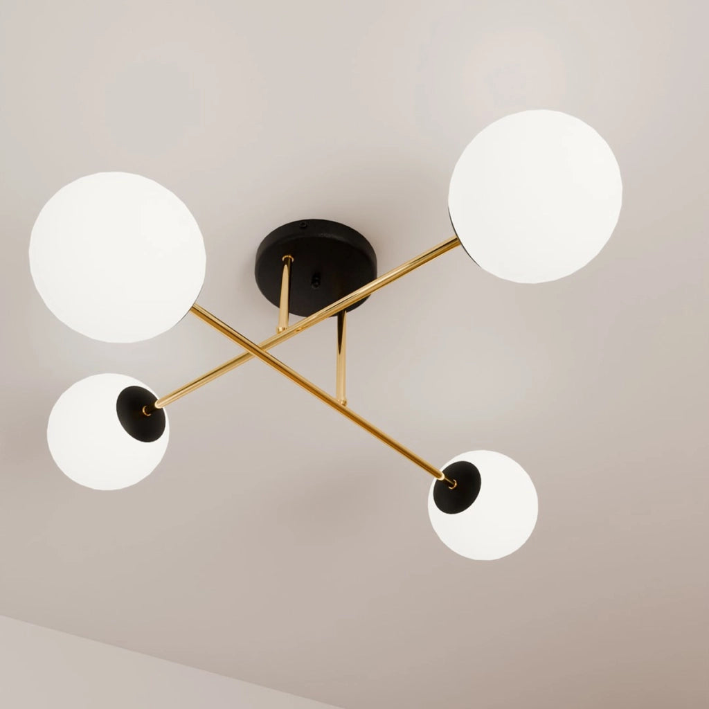 Lampada a sospensione Magnum con struttura in metallo nero e oro