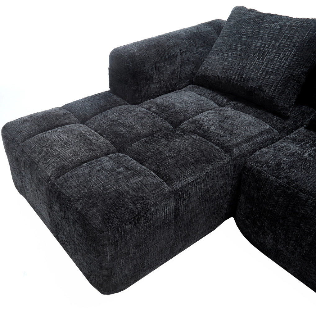 Divano angolare modulare 3 posti in ciniglia nera con chaise longue, tasche laterali e cuscini