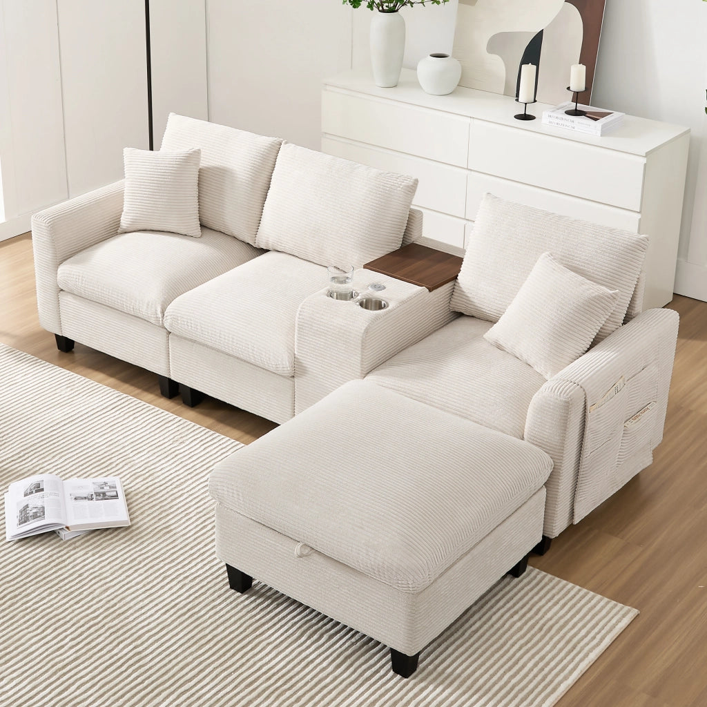 Divano angolare modulare con console centrale USB portabicchieri tasche laterali e cuscini in velluto a coste beige