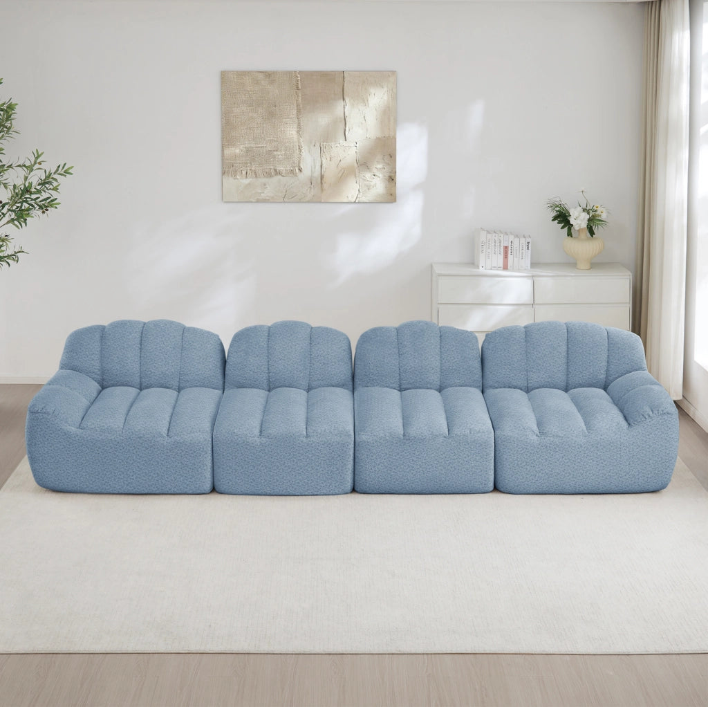 Divano modulare angolare senza struttura in fleece granulare blu; seduta profonda
