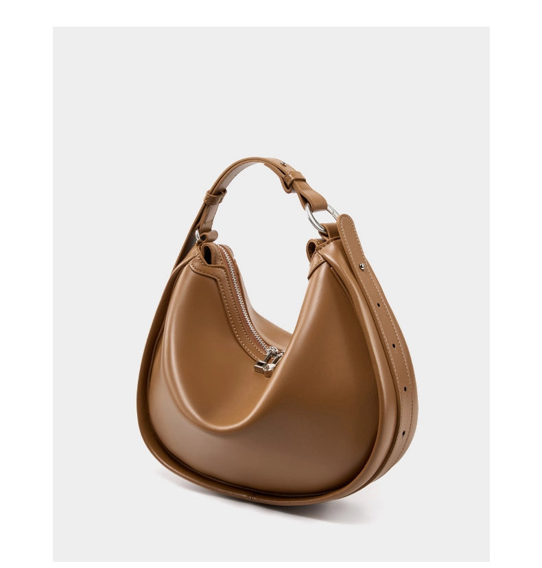 Borsa da donna alla moda in vera pelle, colore marrone.
