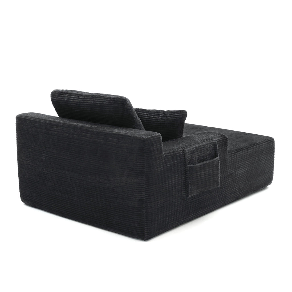 DIVANO in corduroy nero con tasche laterali e cuscini