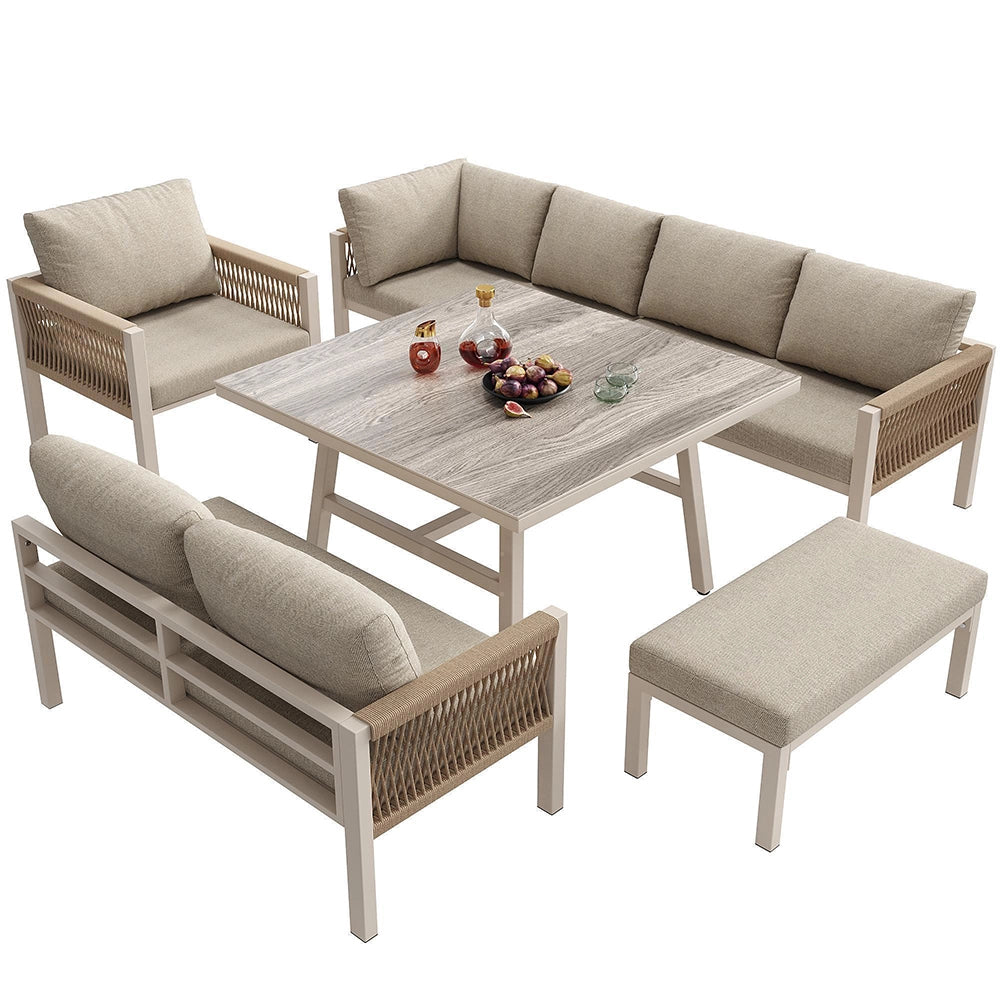 Set da giardino a L in vimini intrecciato a mano - Xylo - Fino a 8 posti, struttura in ferro robusta, cuscini beige, tavolo in vetro effetto legno e poltrona