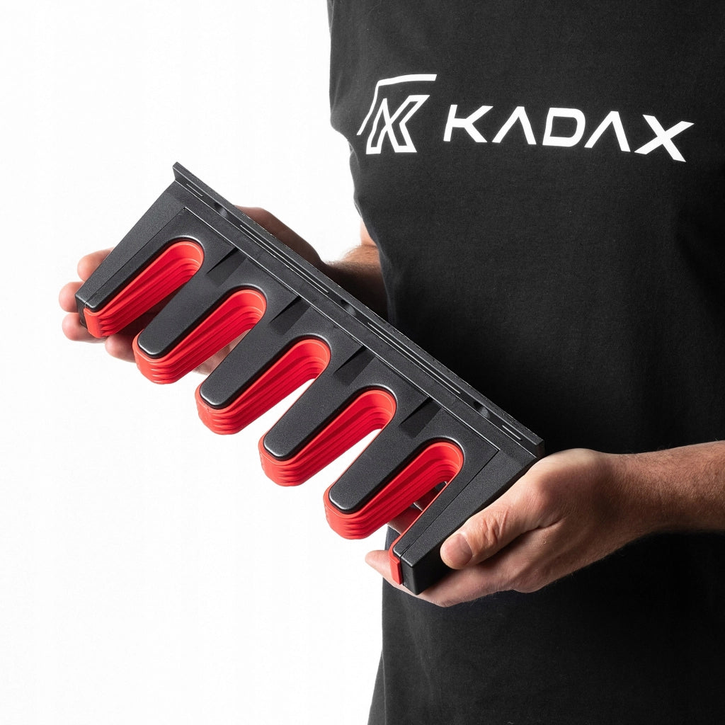Portautensili da parete KADAX per scope e rastrelli, ideale per garage e officine, 31 cm.