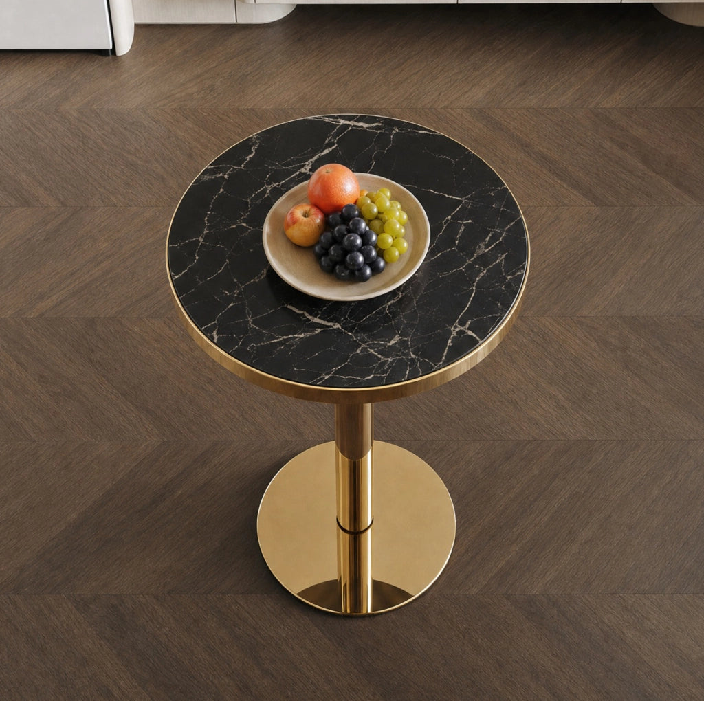 Tavolino rotondo nero e oro con piano effetto marmo