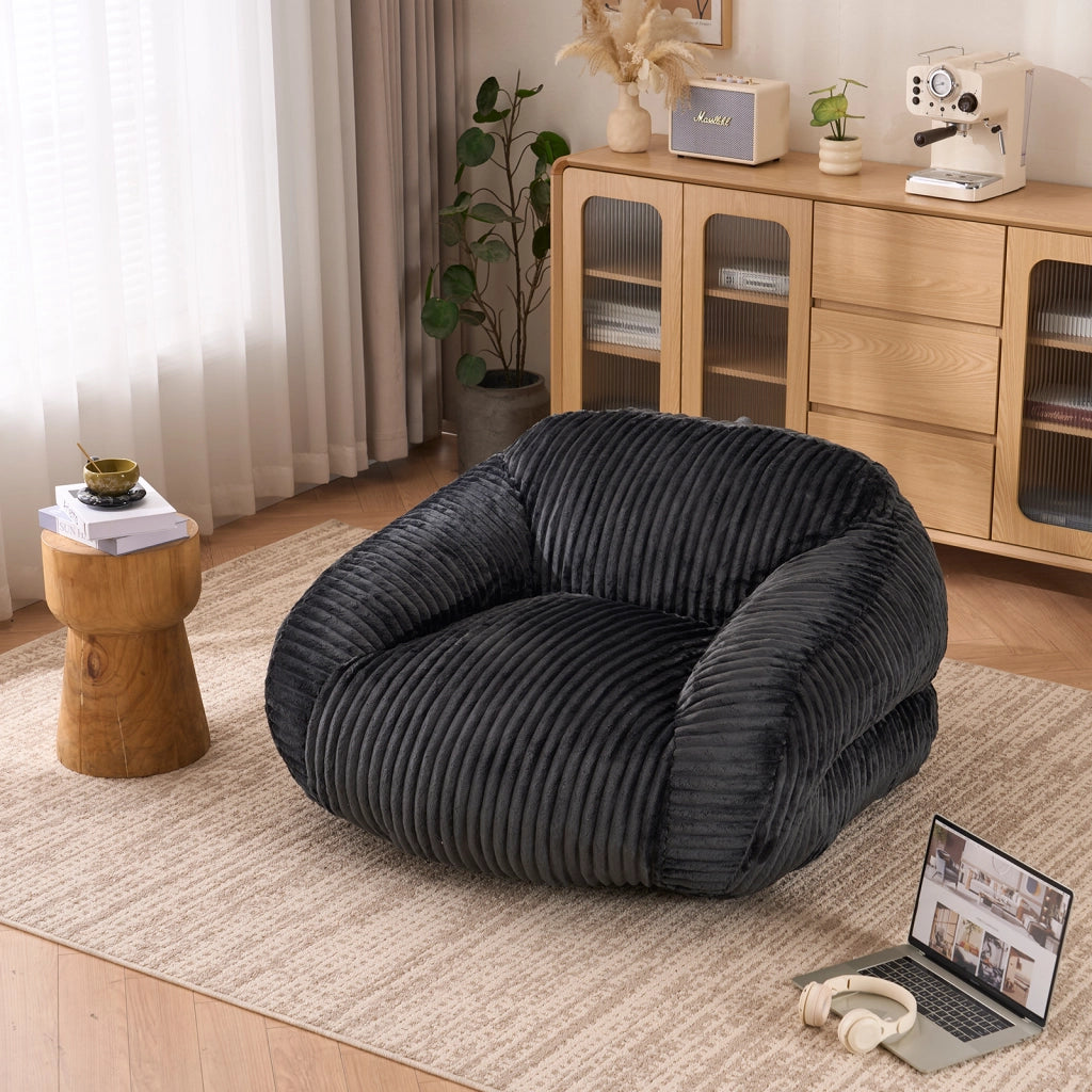 Pouf ergonomico con schienale sagomato e imbottitura in schiuma per salotto e camera, in velluto a coste grigio scuro