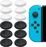 8 Paia di Coperture per Joystick per Joy Con Nintendo Switch - Nero/Bianco