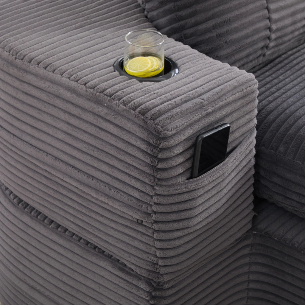 Poltrona letto 2 in 1 con braccioli rimovibili, schienale alto e doppio portabicchieri in velluto a coste grigio scuro