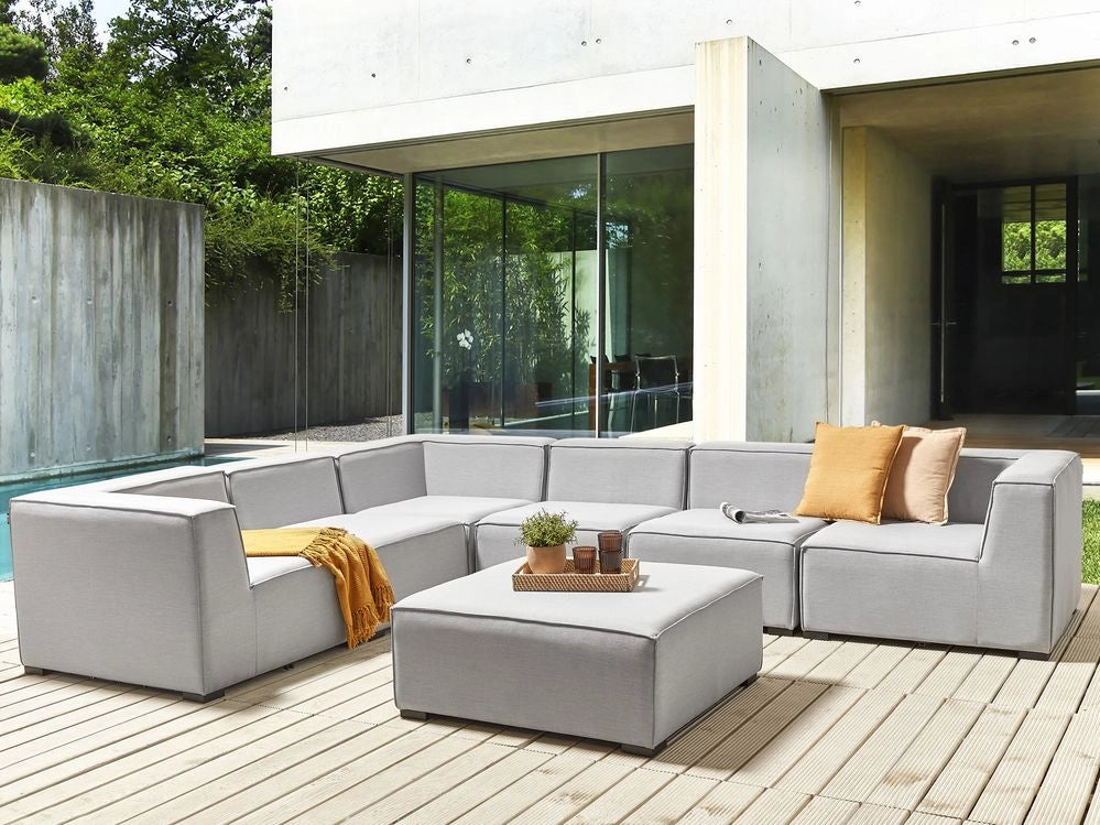 Set divano ad angolo per ambienti interni ed esterni con rivestimento in tessuto grigio a 7 posti con divano da giardino ottomana destro