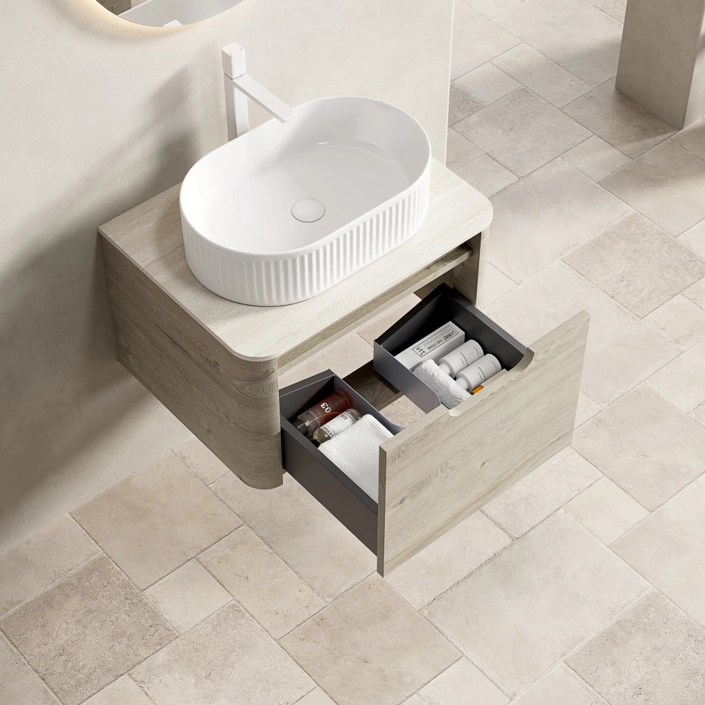 Mobile bagno sospeso con lavabo ovale e cassetto ammortizzato; piano in pietra sinterizzata; 60×46×50.2 cm