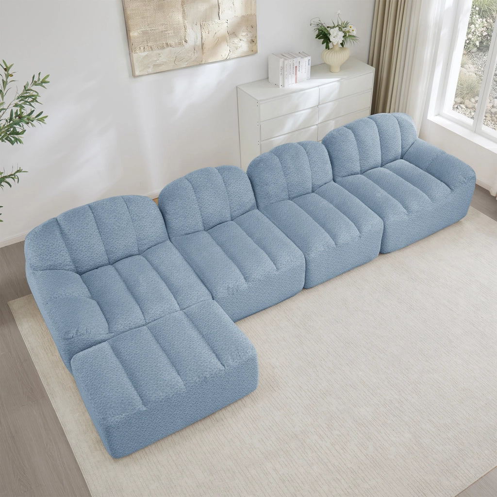 Divano modulare 4 posti con pouf e seduta ampia, schienale ergonomico per soggiorno in fleece granulato blu