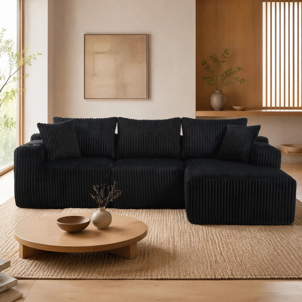 Divano modulare nero in velluto a coste con chaise longue