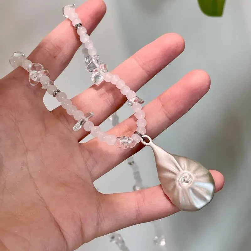 Collana di conchiglie con perline fatta a mano: un regalo vintage con gioielli in cristallo