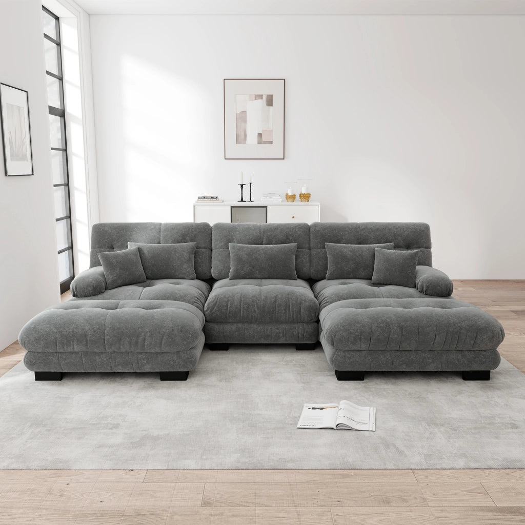 Divano angolare modulare con seduta profonda, pouf e cuscini lombari, design vintage, in ciniglia grigia