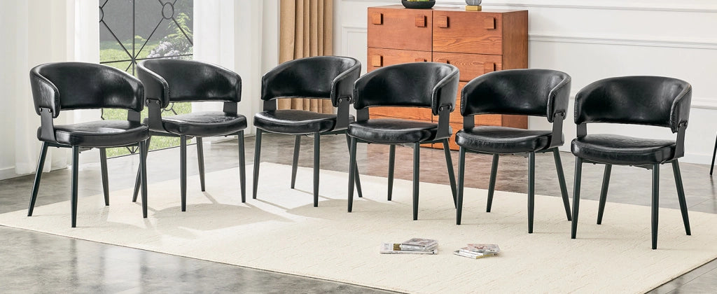 Sedie da pranzo in PU nero, design moderno con schienale sagomato e gambe in metallo