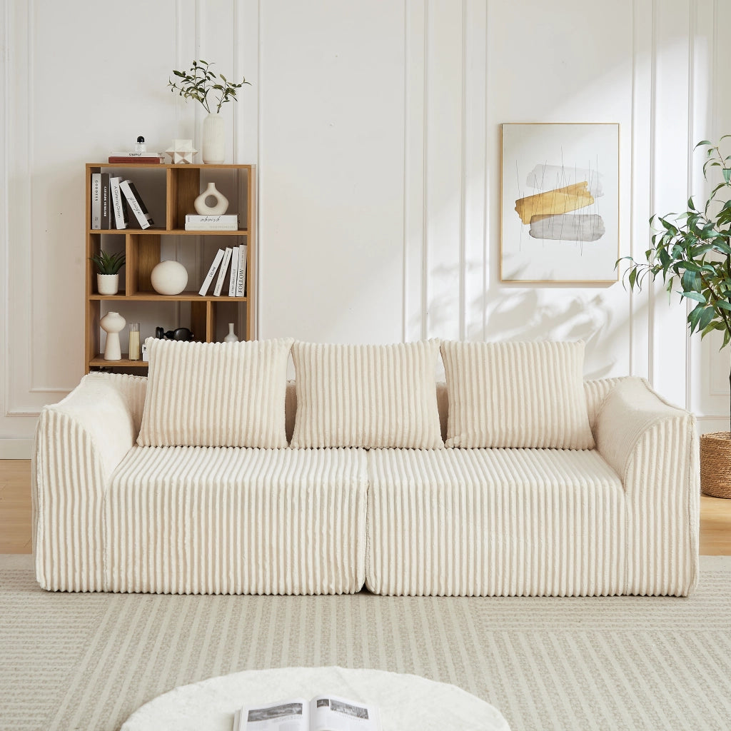 Divano modulare in ciniglia con braccioli e schienale curvi, seduta ampia e imbottitura in schiuma beige