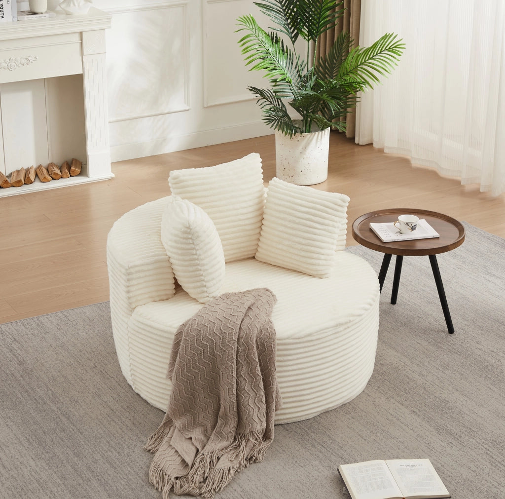 Poltrona lounge rotonda beige in velluto a coste con 3 cuscini
