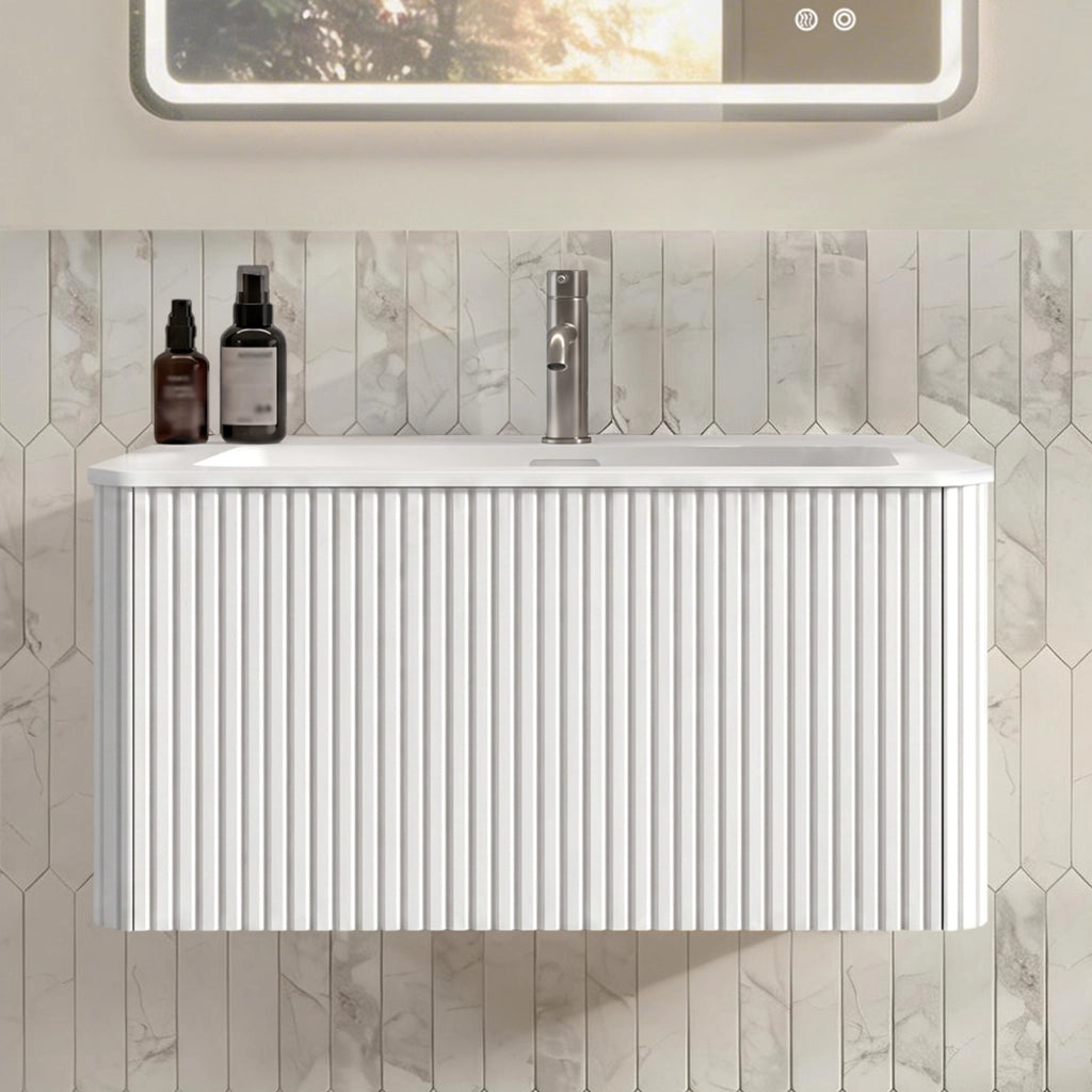 Mobile bagno con lavabo e cassetti push to open in MDF; compensato e Solid Surface bianco