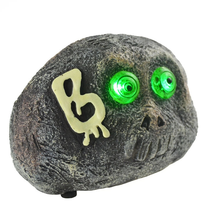 Teschio a Forma Pietra per Halloween con Occhi a LED Verdi