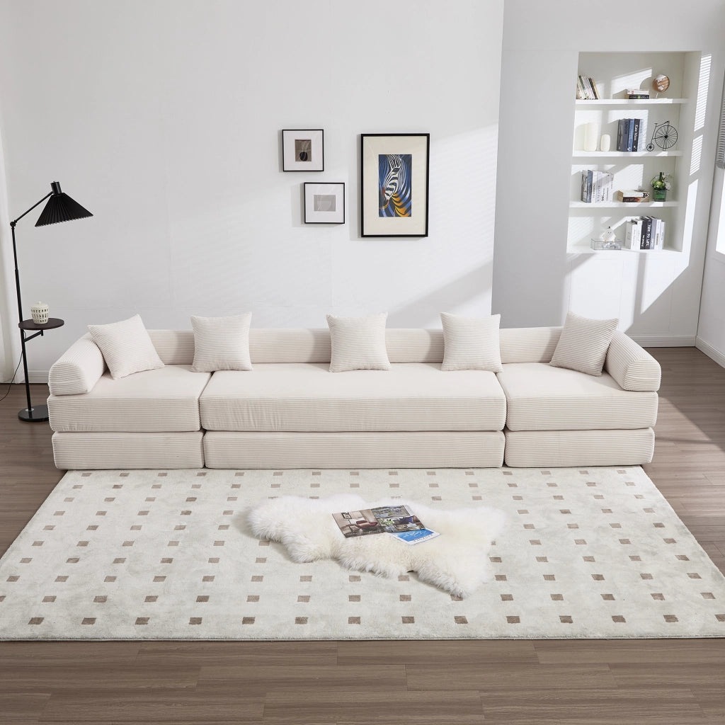 Divano modulare in velluto corduroy beige con tasca laterale, funzione letto e imballo sottovuoto