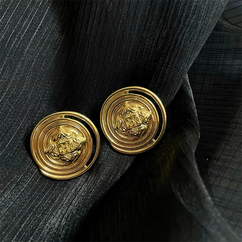 Orecchini a bottone vintage in metallo con ago in argento S925