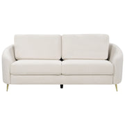 Divano 3 posti in tessuto beige chiaro con piedi dorati curve morbide stile glamour elegante soggiorno