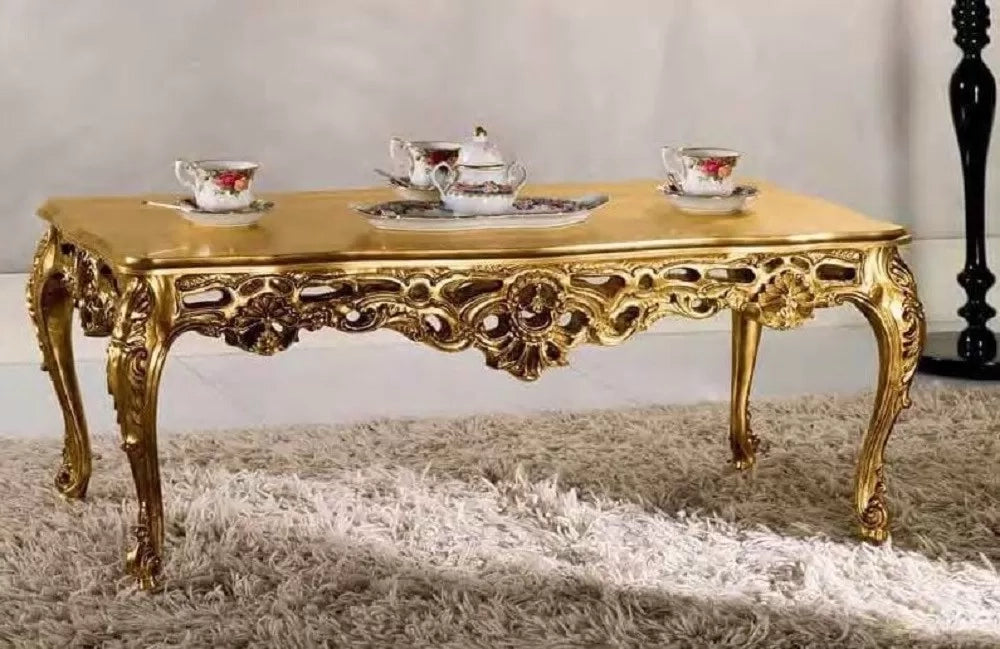 Tavolino barocco in foglia oro bronzo con piano in legno misura  : l. 109 x h. 43 x p.57