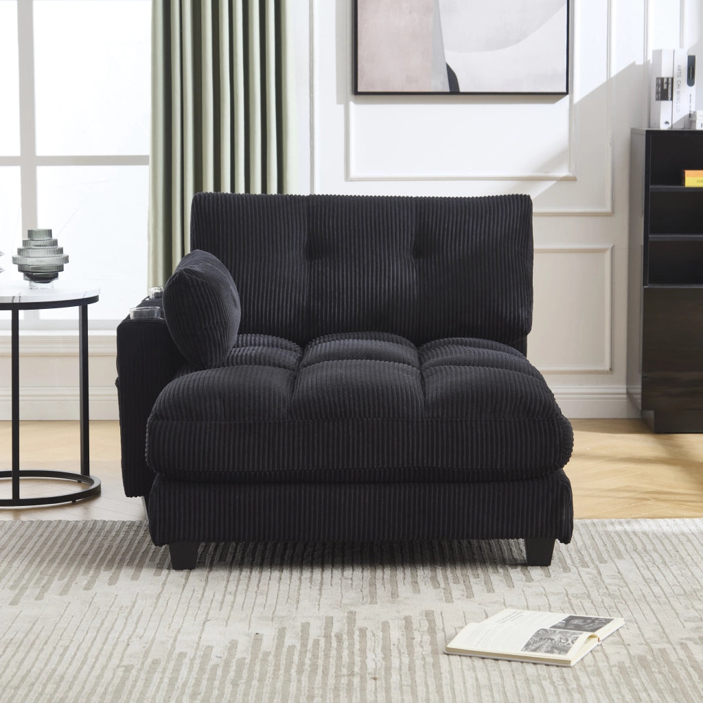 SEDIA LOUNGE in corduroy nero con braccioli reversibili, portabicchieri e porte USB