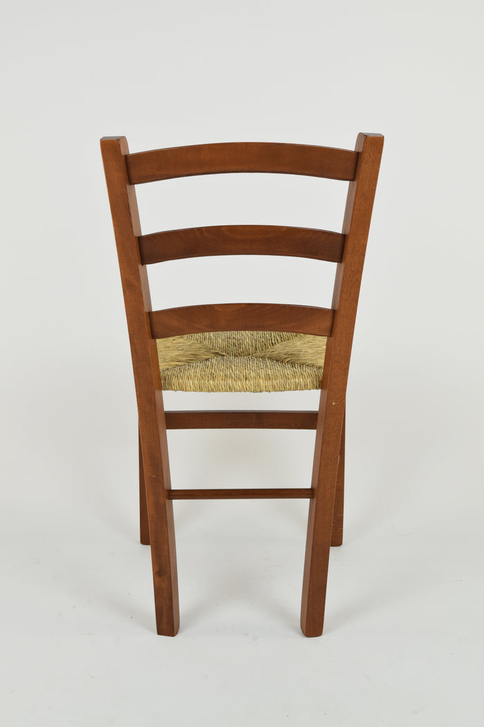 Sedia Venice Tommychairs, robusta struttura in legno di faggio verniciata in noce chiaro e seduta in paglia