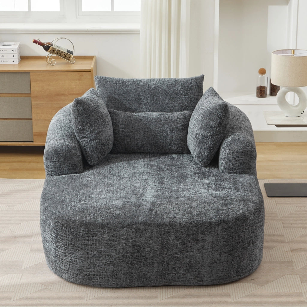 Chaise longue imbottita in velluto a coste grigio con braccioli e cuscini