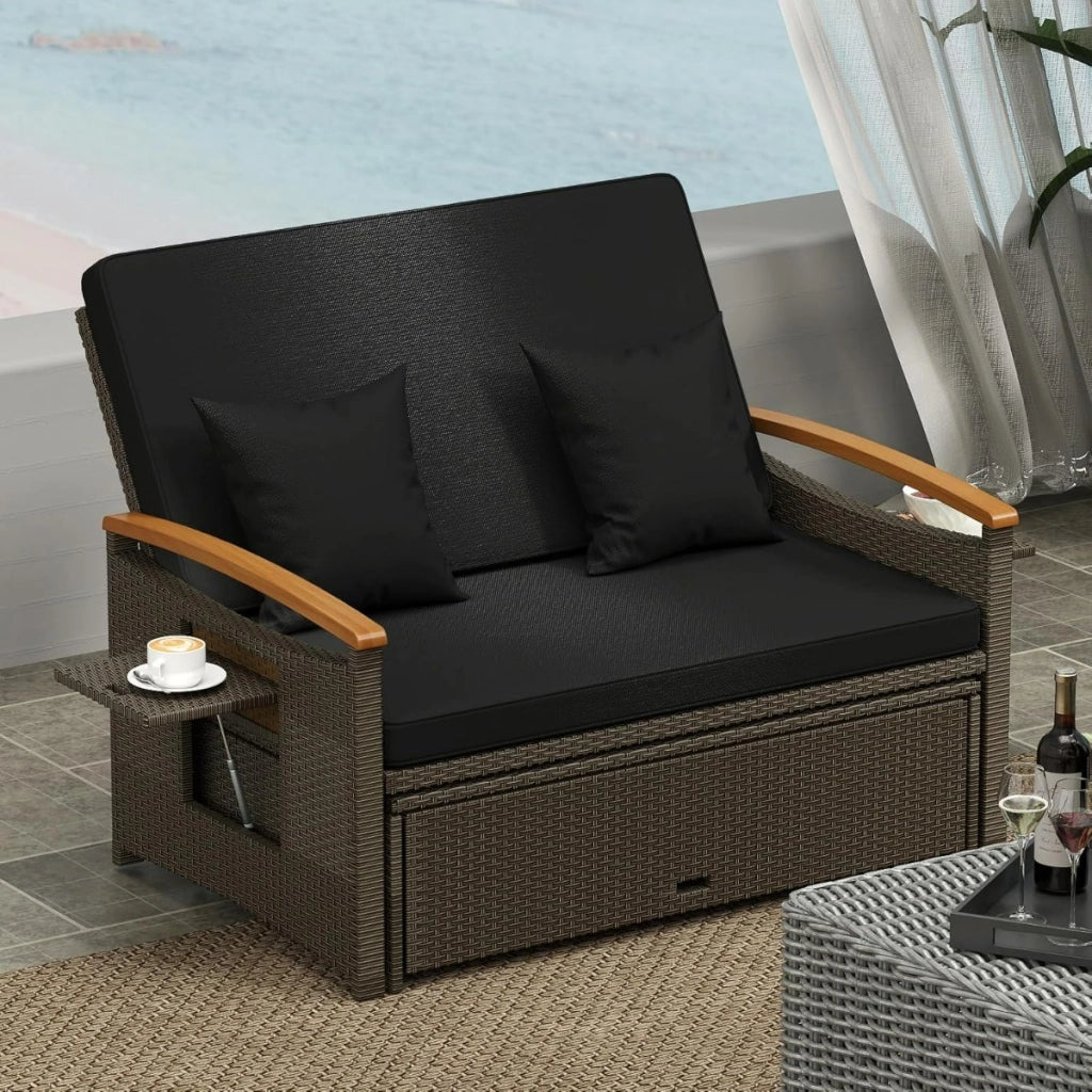 Set divano da giardino in rattan con cuscino e panca contenitore, Divano letto da esterno Nero