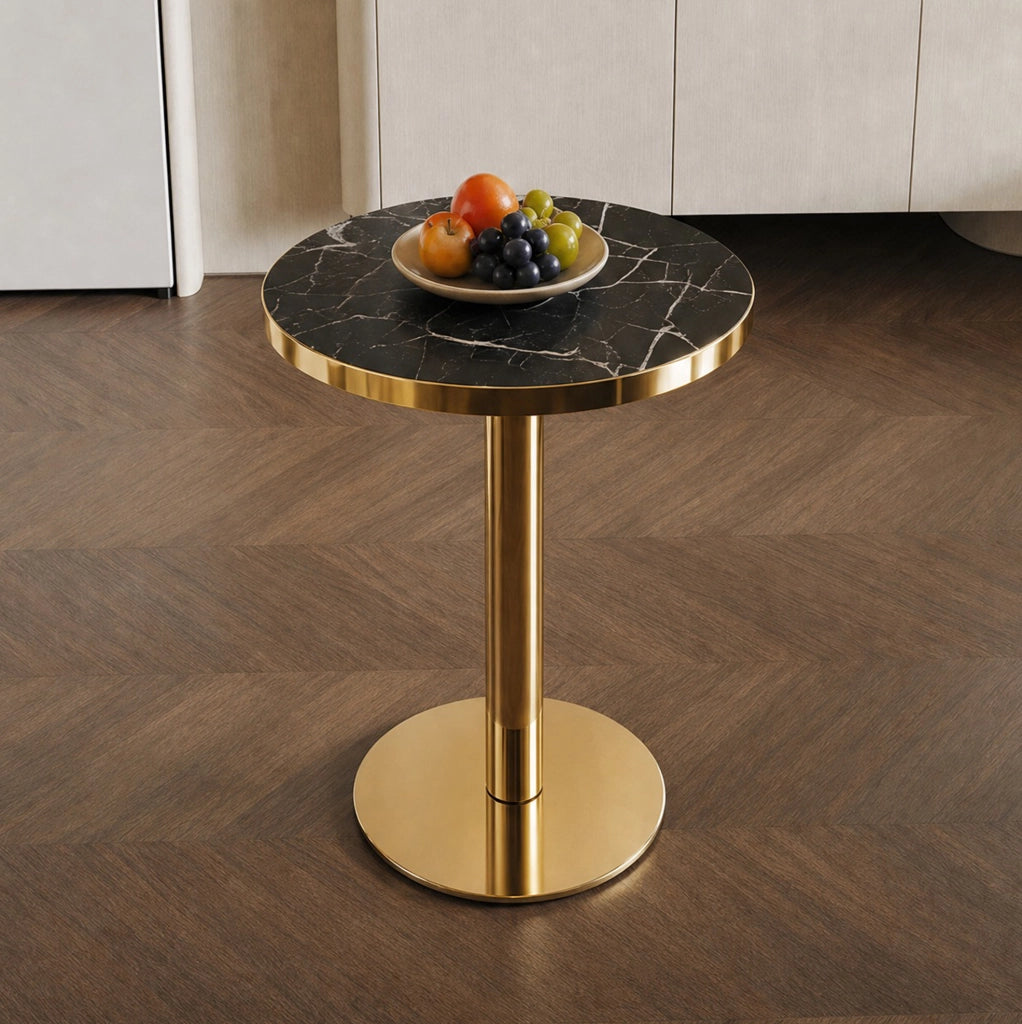 Tavolino rotondo nero e oro con piano effetto marmo e base stabile