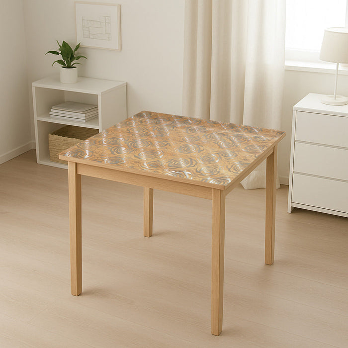 Rotolo pellicola protettiva per tavolo in PVC siliconato – modello rose Materiale: PVC siliconato trasparente  Dimensioni rotolo: 0,80 × 20 m Breckner Germany