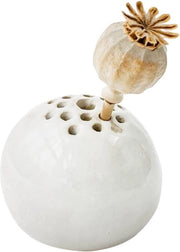 Decorazione da tavolo miniatura con vasca per piante in ceramica perforata a forma rotonda.