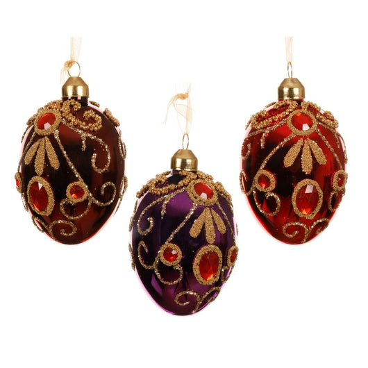 PALLINA NATALIZIA UOVO VETRO LUCIDO CON GLITTER D6X8CM 3 COLORI INDICARE VERSION