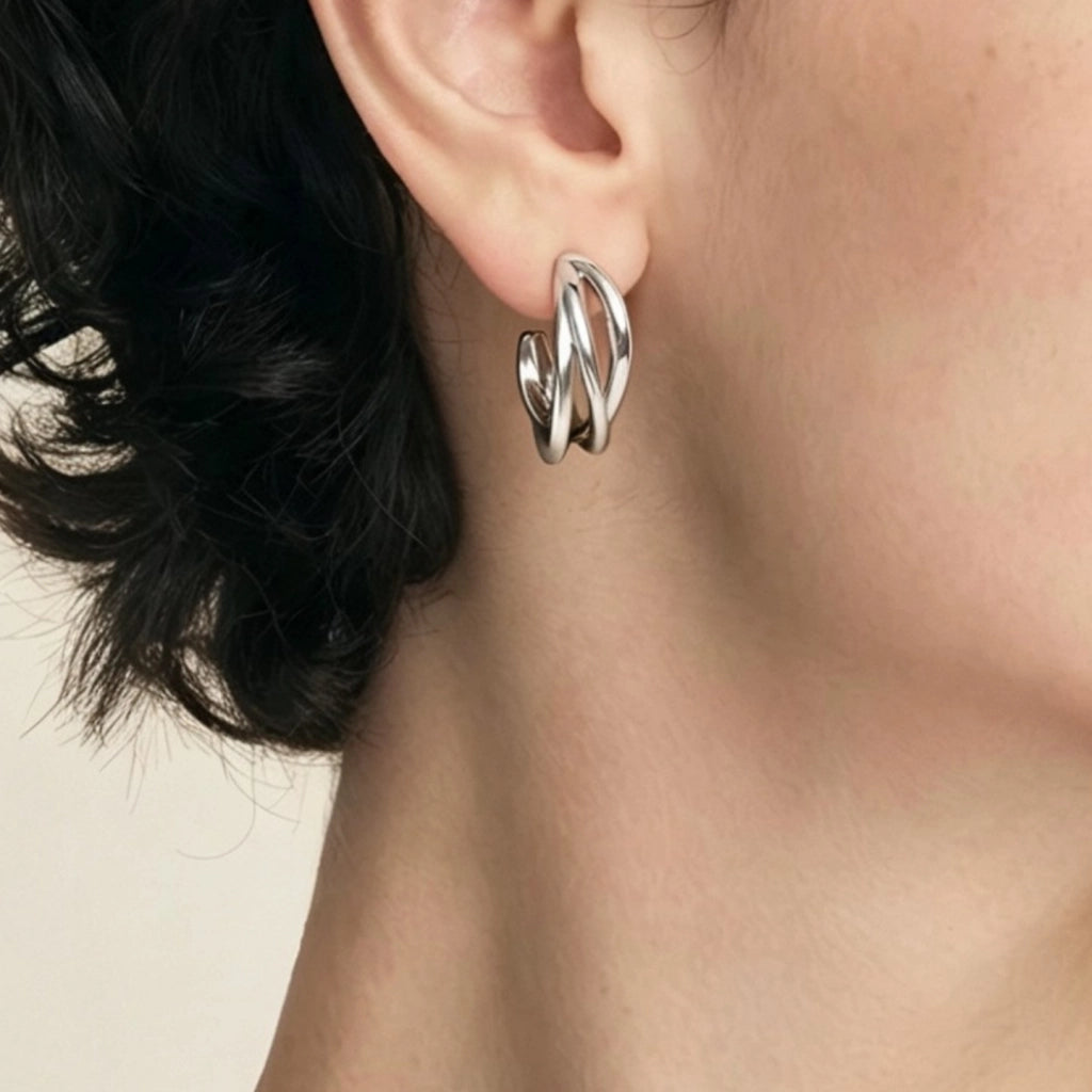 Lussuosi orecchini metallici in oro e argento