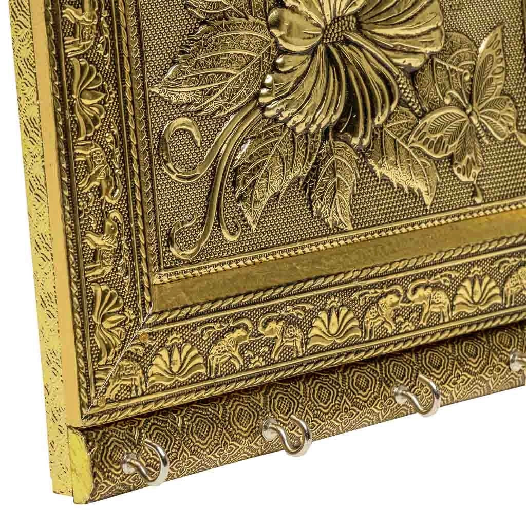 Portachiavi in metallo dorato goffrato 25x22,5x2h