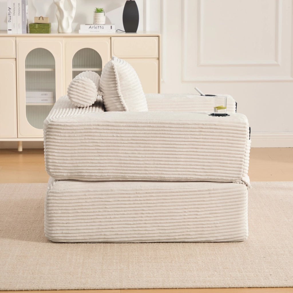 Divano letto modulare con seduta in schiuma e molle, tasche laterali e portabicchieri in velluto a coste beige