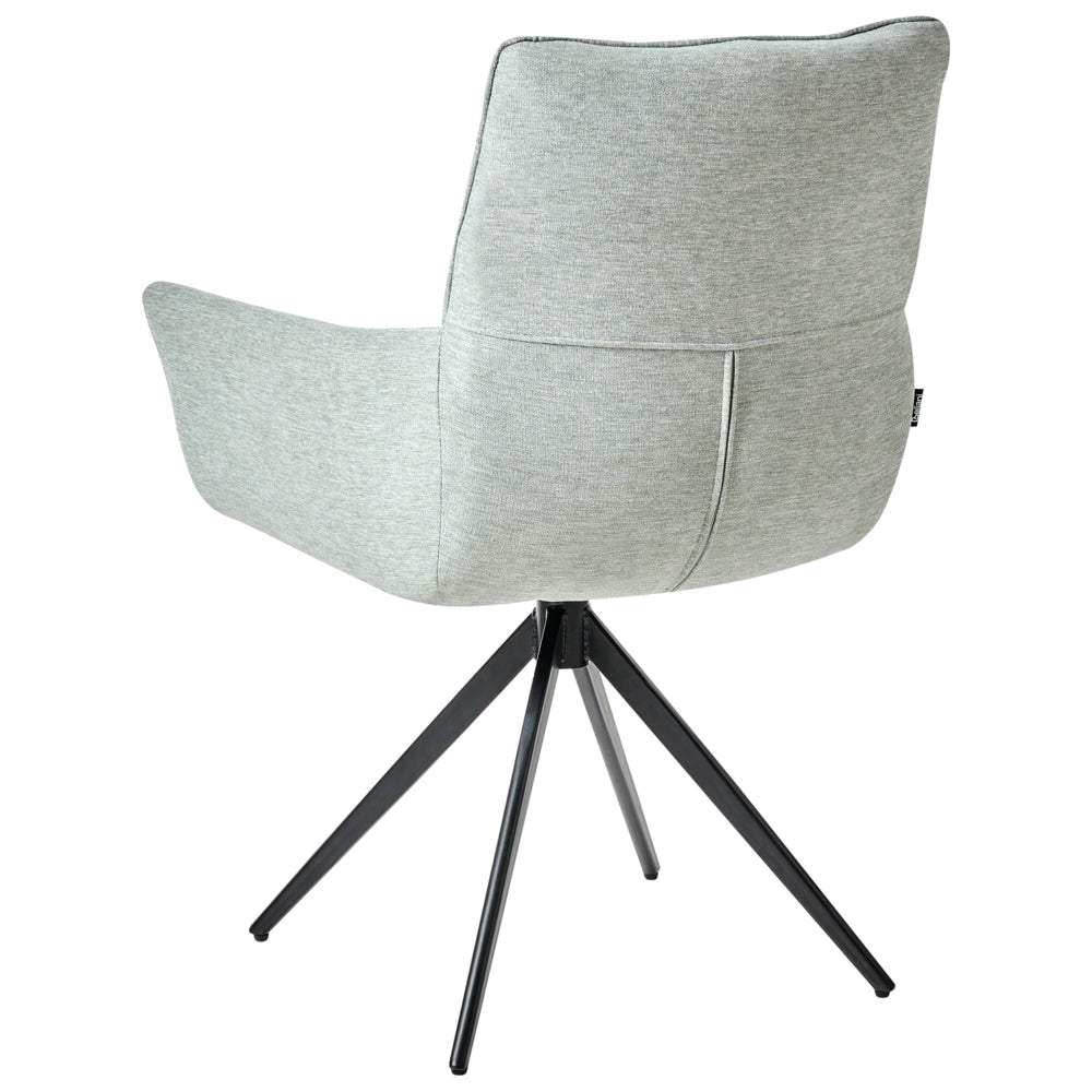 Sedia da pranzo Mint con rivestimento in poliestere, gambe in ferro nero, braccioli e base girevole stile moderno per la sala da pranzo.