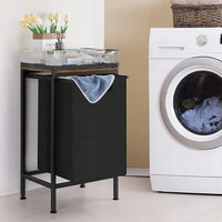 Cesto della biancheria con misure 72x33x50 cm, colore nero, capiente e pratico.