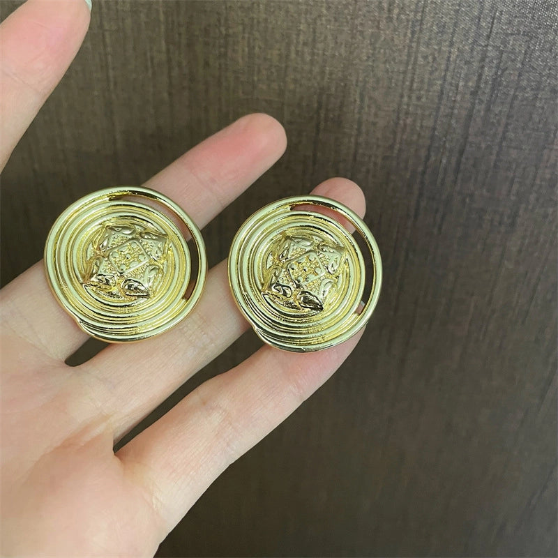 Orecchini a bottone vintage in metallo con ago in argento S925
