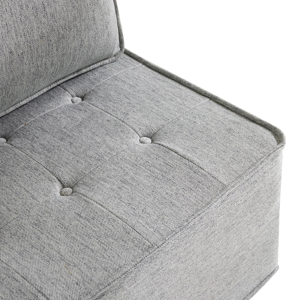 Sofà modulare compatto in grigio chiaro, design salvaspazio per piccoli ambienti