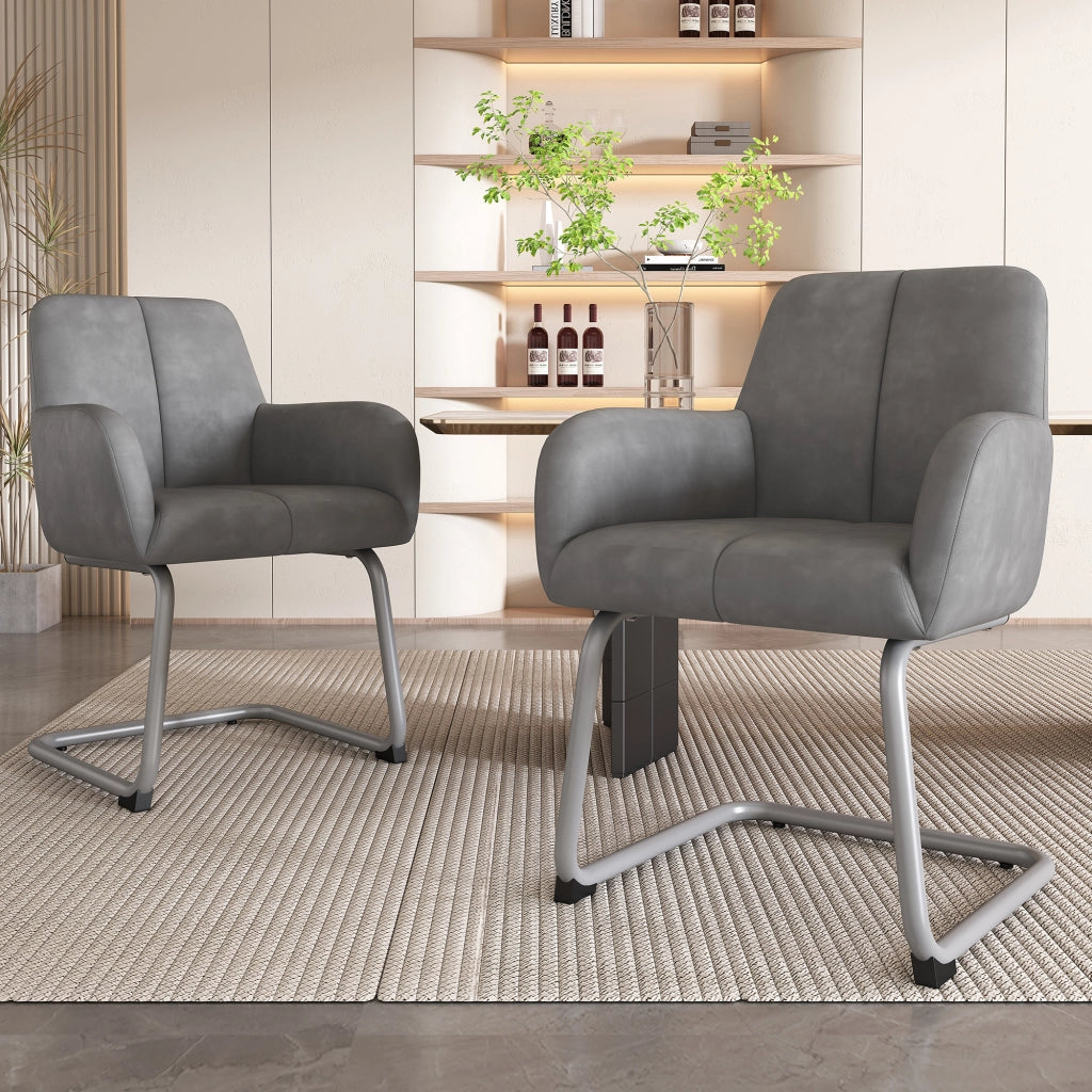 Set di 2 sedie da pranzo in ecopelle grigia con struttura in acciaio, design ergonomico e braccioli integrati