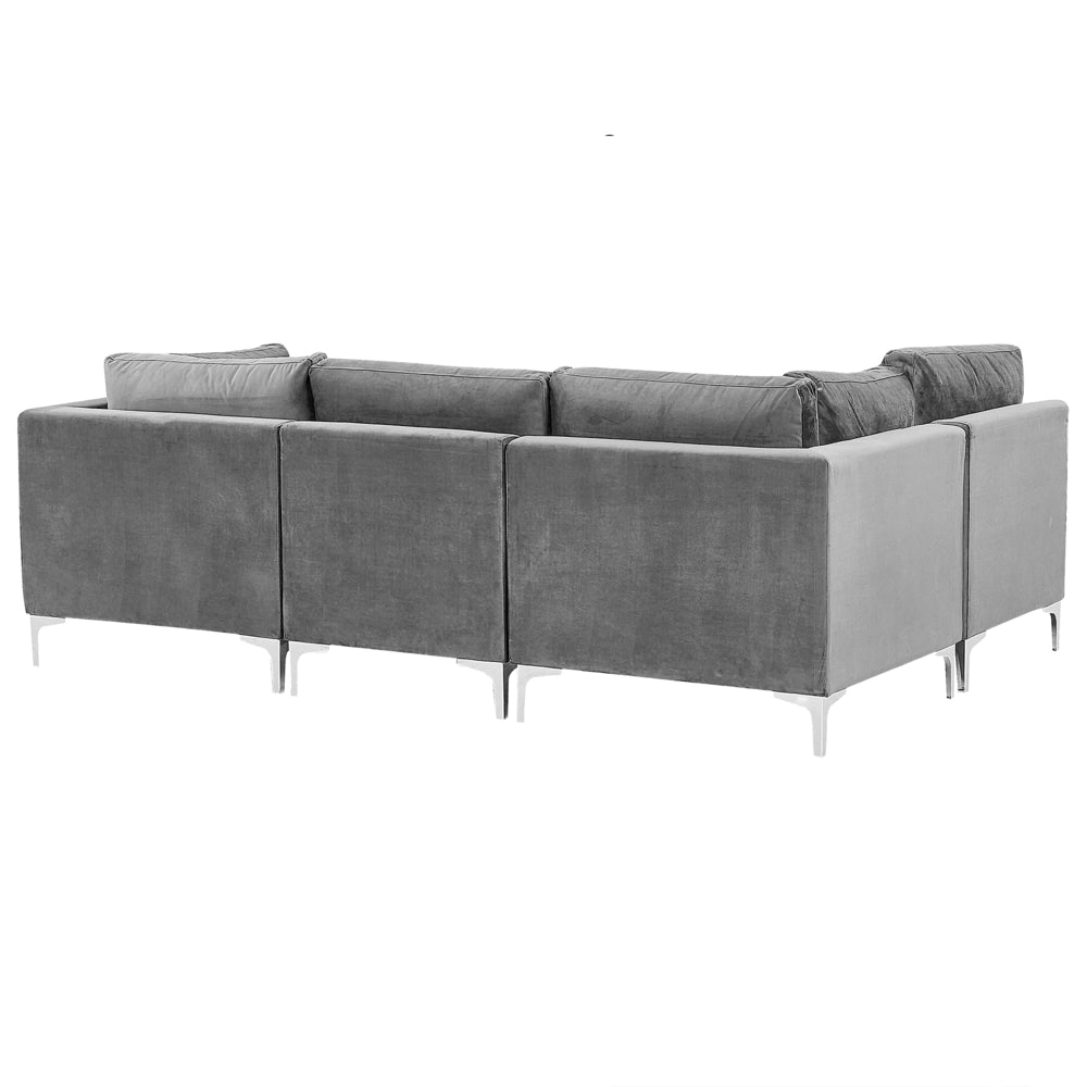Divano componibile ad angolo versione destra in velluto grigio 4 posti a forma di L con gambe in metallo argento stile glamour