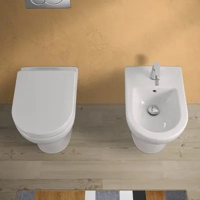 Sanitari filomuro con brida scarico universale e copriwc originale  Pestum